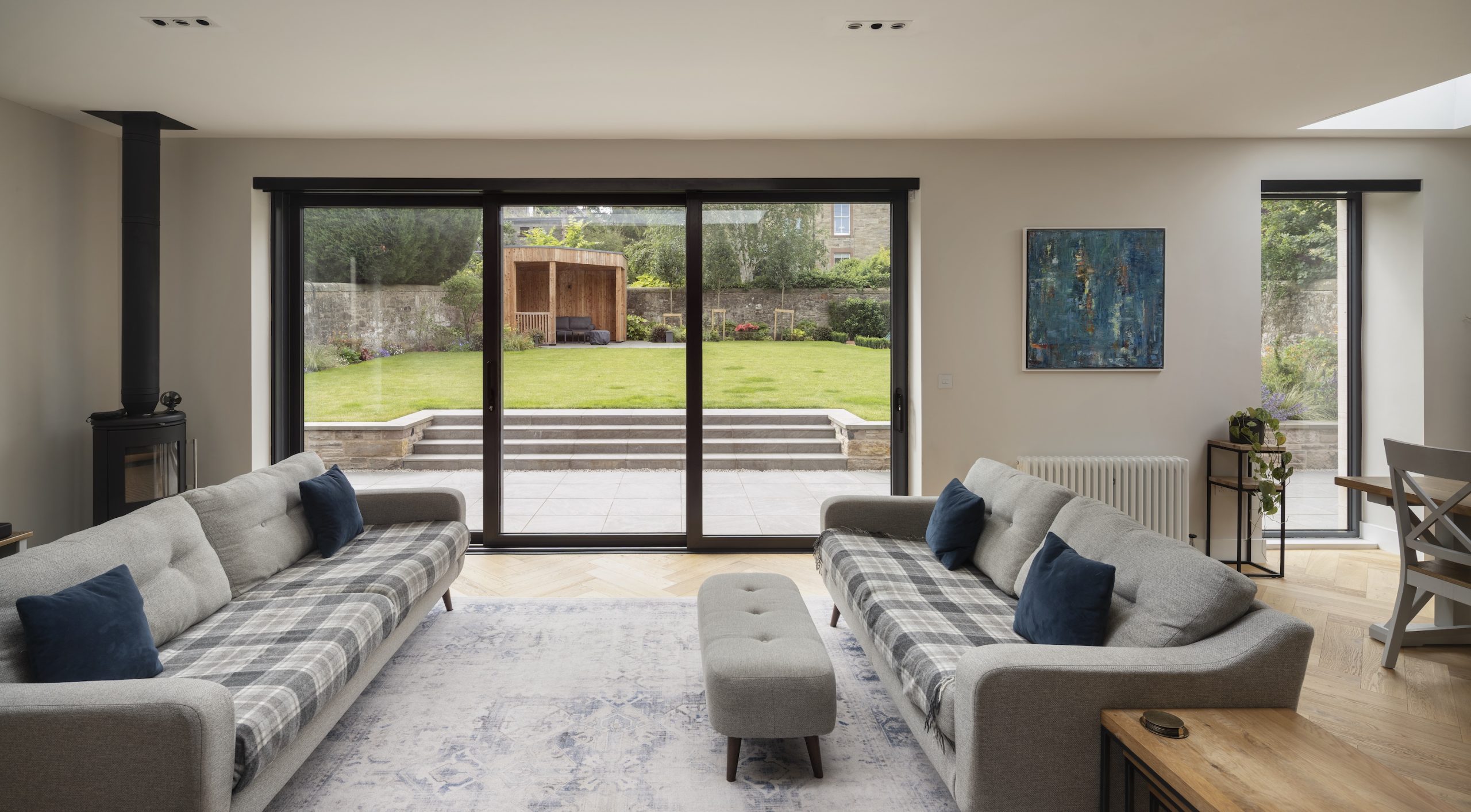 Living room with large sliding doors to the garden