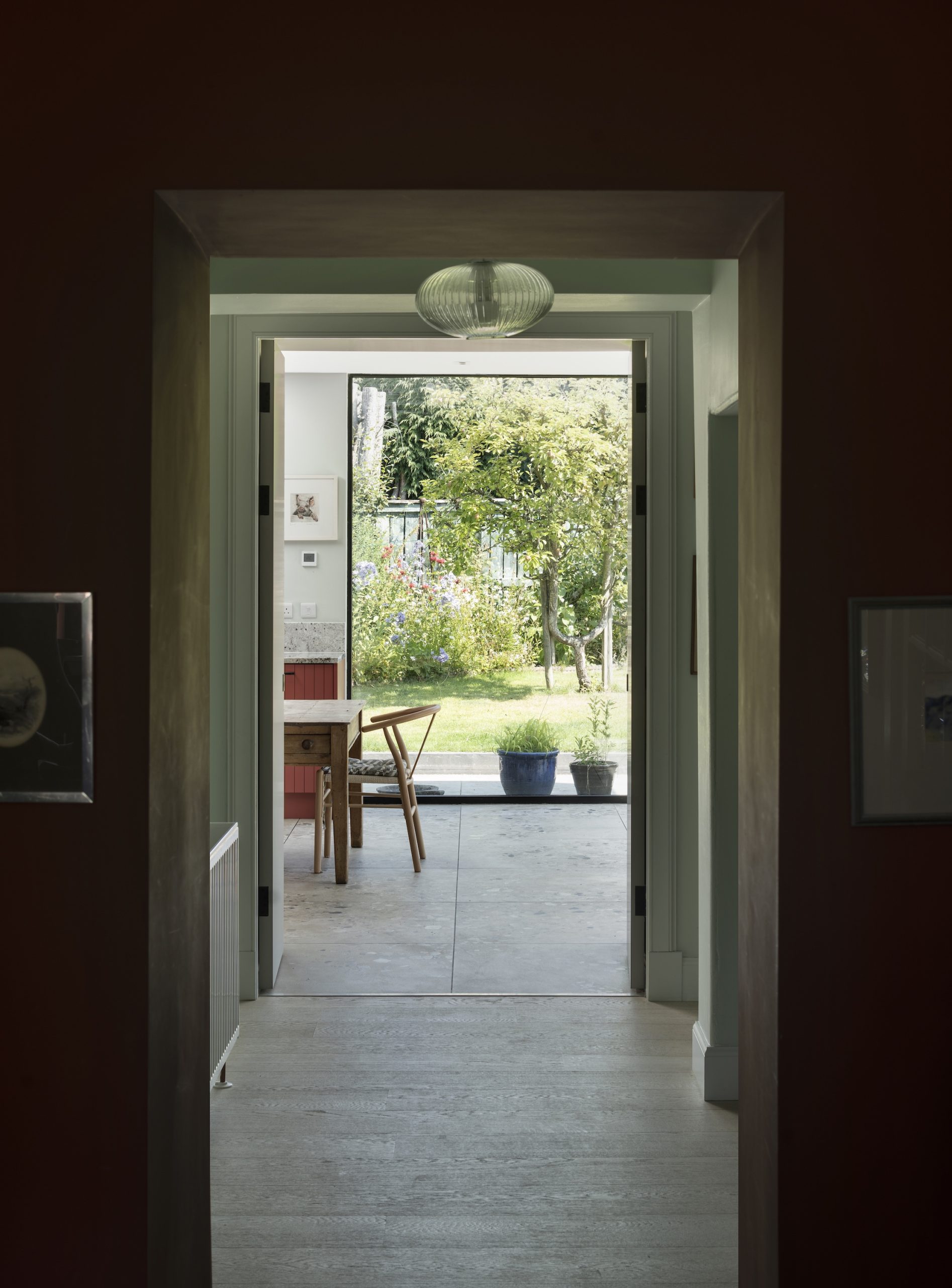 Internal view through house to extension with large glazing