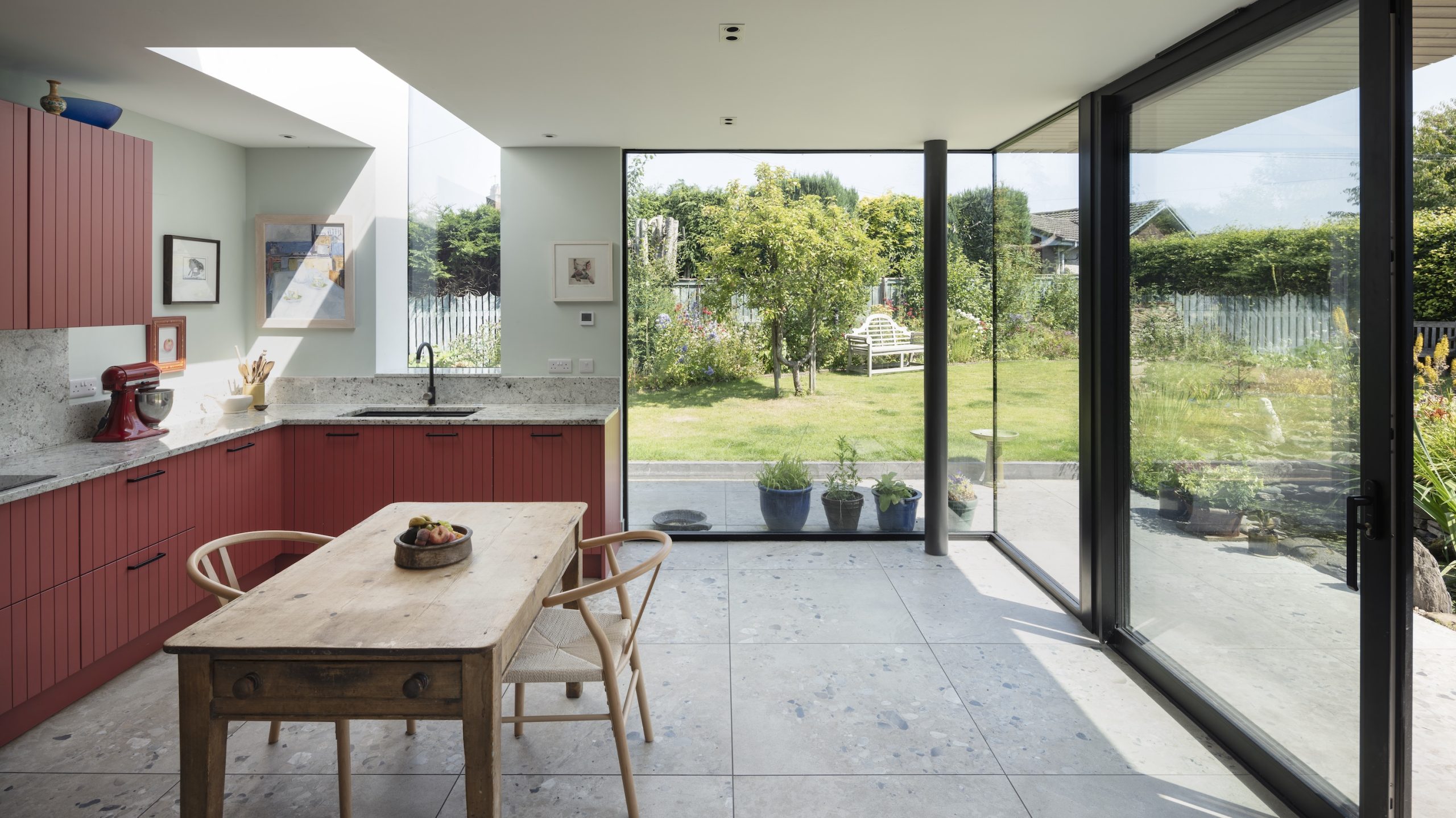 Extension with kitchen in Bamboozle by Farrow & Ball, frameless window & rooflight and frameless corner glazing